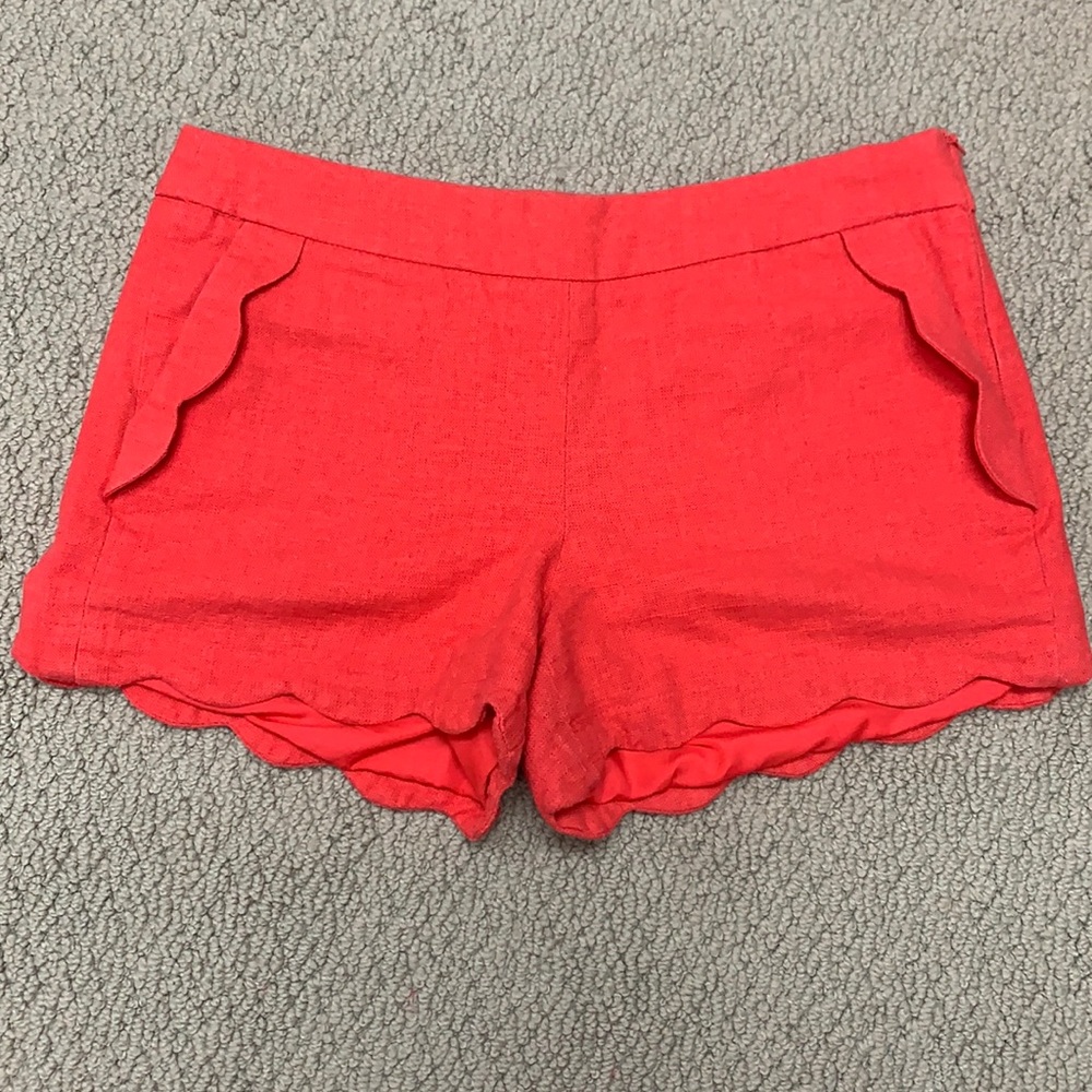 Red scalloped shorts